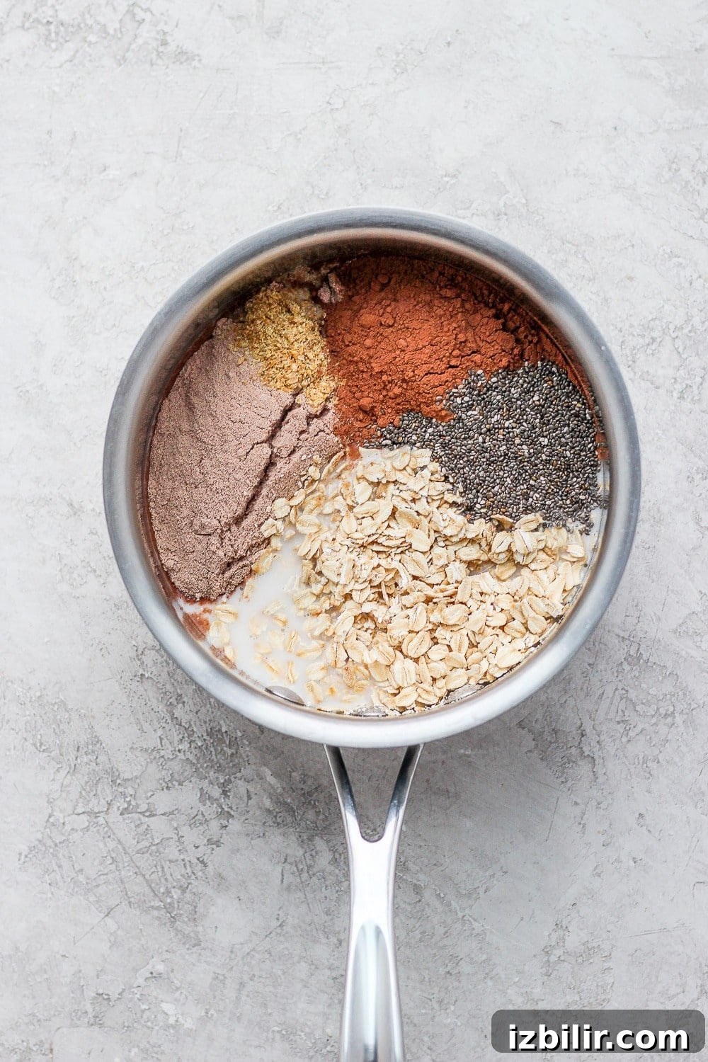Chocolate Protein Oatmeal Recipe 6 chocolate sea salt protein oatmeal in a pot ready to be cooked