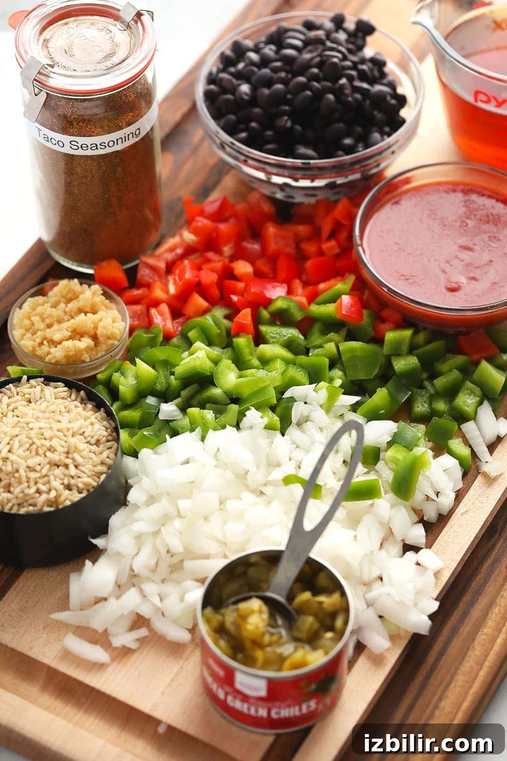 Ingredients for Mexican Ground Beef Skillet ground beef skillet ingredients on cutting board.