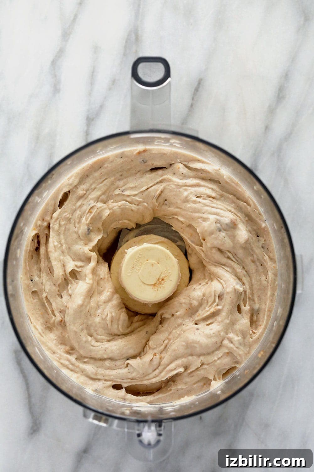 Vegan banana soft serve in a food processor