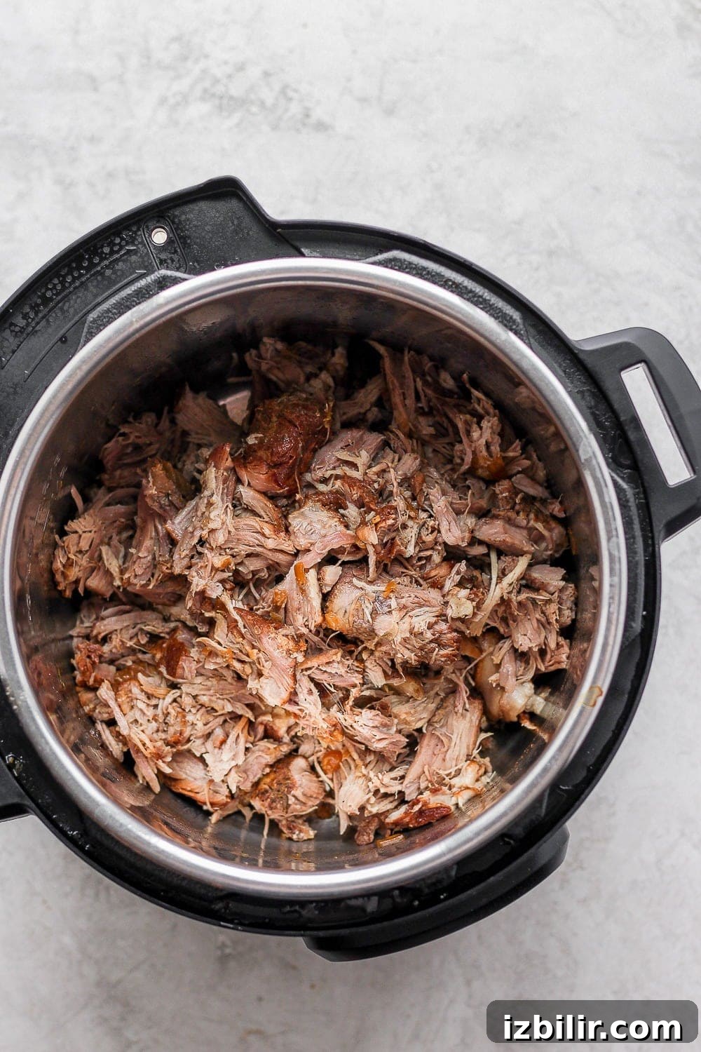 Tender Instant Pot Pulled Pork Recipe: Ready in 1 Hour 5 Cooked shredded pulled pork in Instant Pot