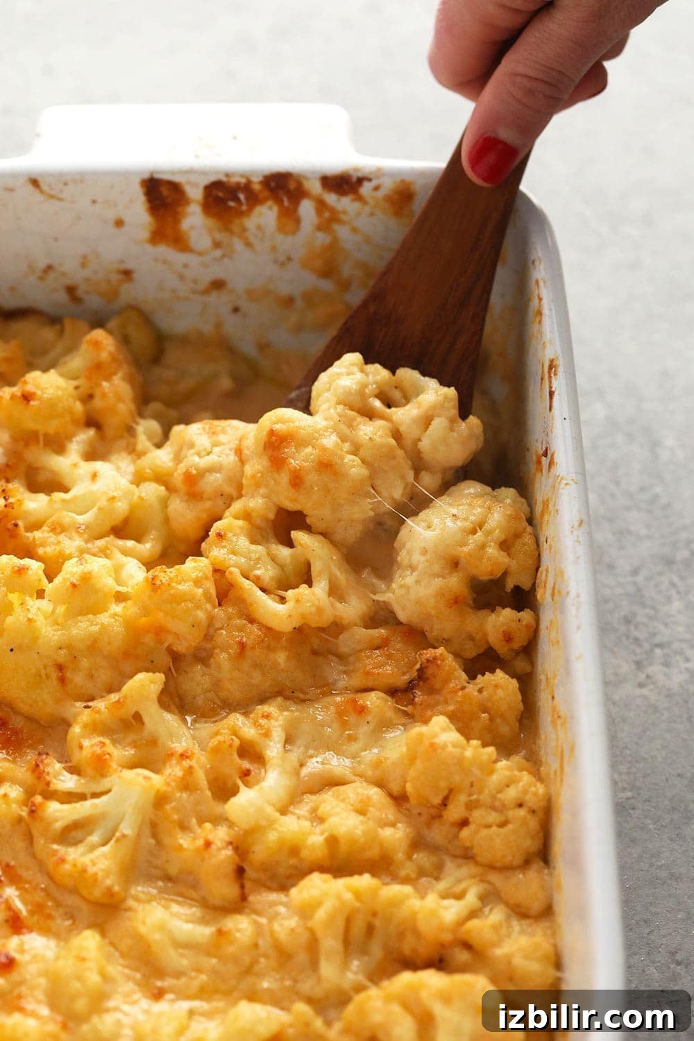 Three Cheese Cauliflower Mac and Cheese cauliflower mac and cheese in a casserole dish