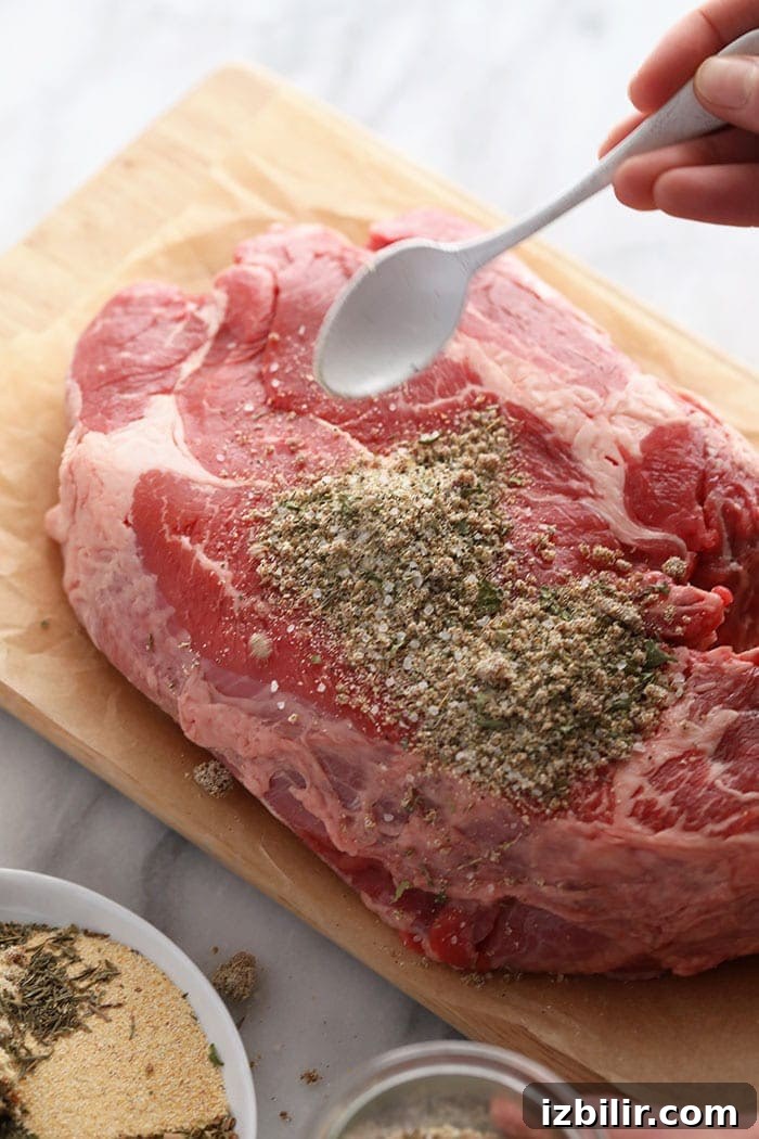 Seasoning a beef roast with seasoning Seasoning a beef roast with seasoning