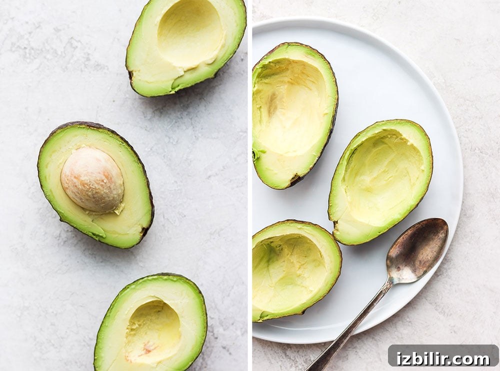 Hollow out perfectly ripe avocados and make a batch of these avocado baked eggs! Hollowed out avocados prepared for baking