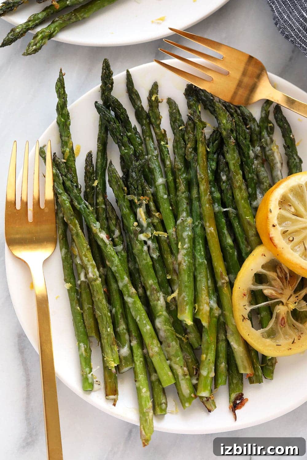 roasted asparagus on a plate Oven roasted asparagus on a plate.