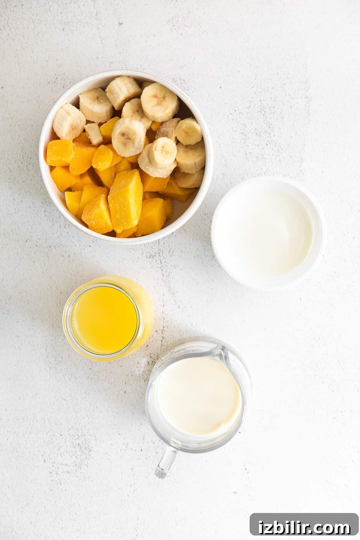 Creamy Mango Smoothie Recipe 3 Frozen Mango, frozen banana, and other ingredients