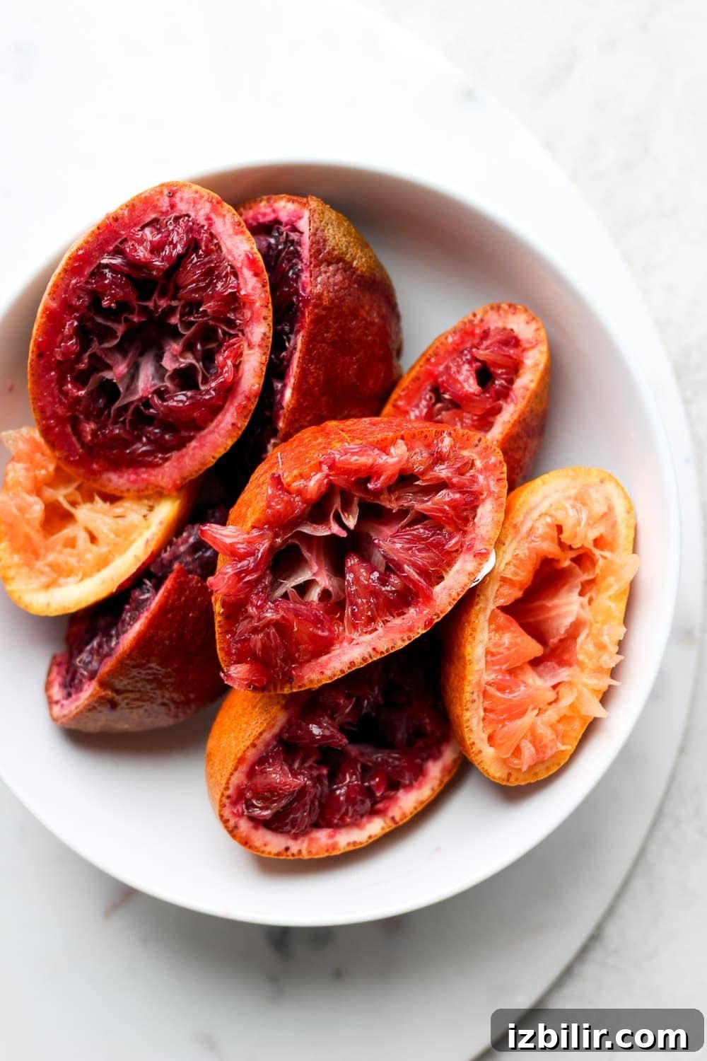 Freshly juiced blood oranges for margaritas. Juiced blood oranges