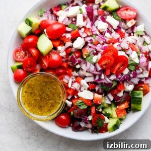 Authentic Greek Salad with Feta, Tomatoes and Kalamata Olives 2 Greek salad recipe with tomatoes, cucumbers, and onions.