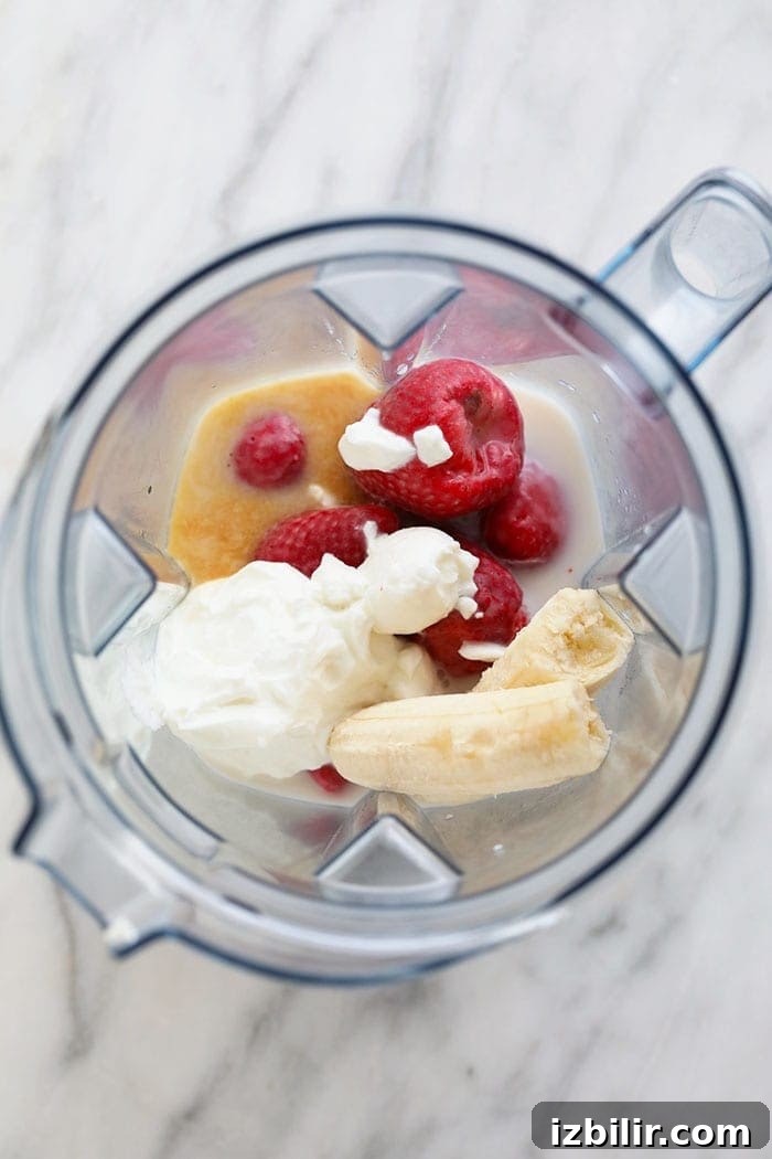 Smoothie ingredients in a blender
