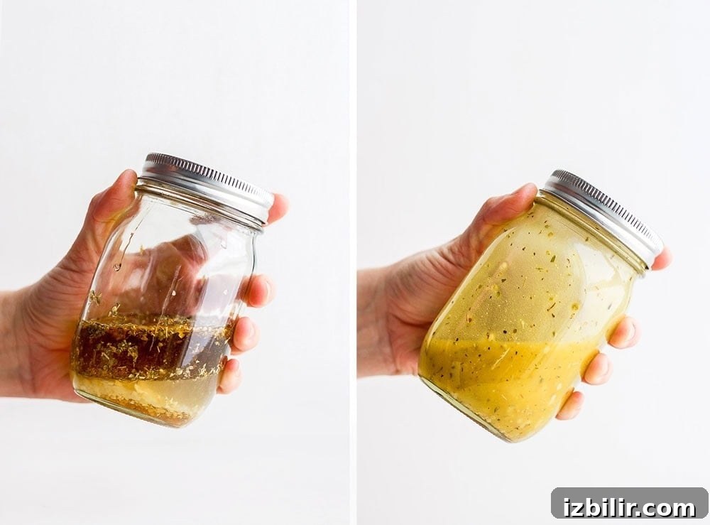 Shaking greek salad dressing up in a jar