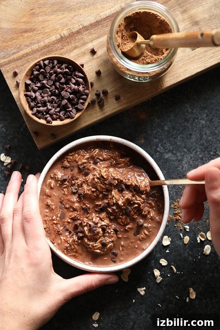 Serve chilled or warmed chocolate chai vegan overnight oats in a bowl