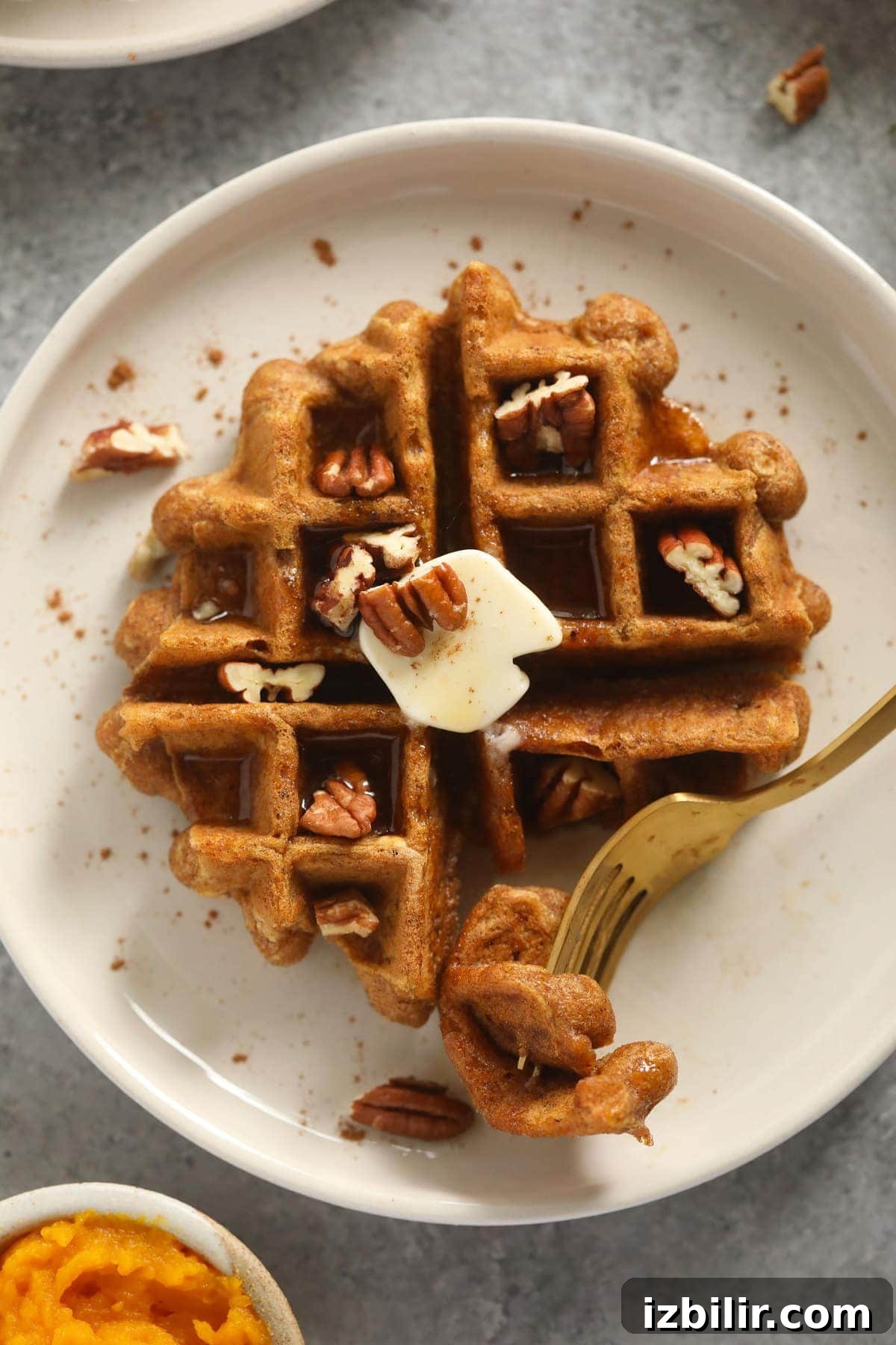 Fluffy Gluten-Free Pumpkin Waffles Recipe 4 pumpkin waffle on plate with fork
