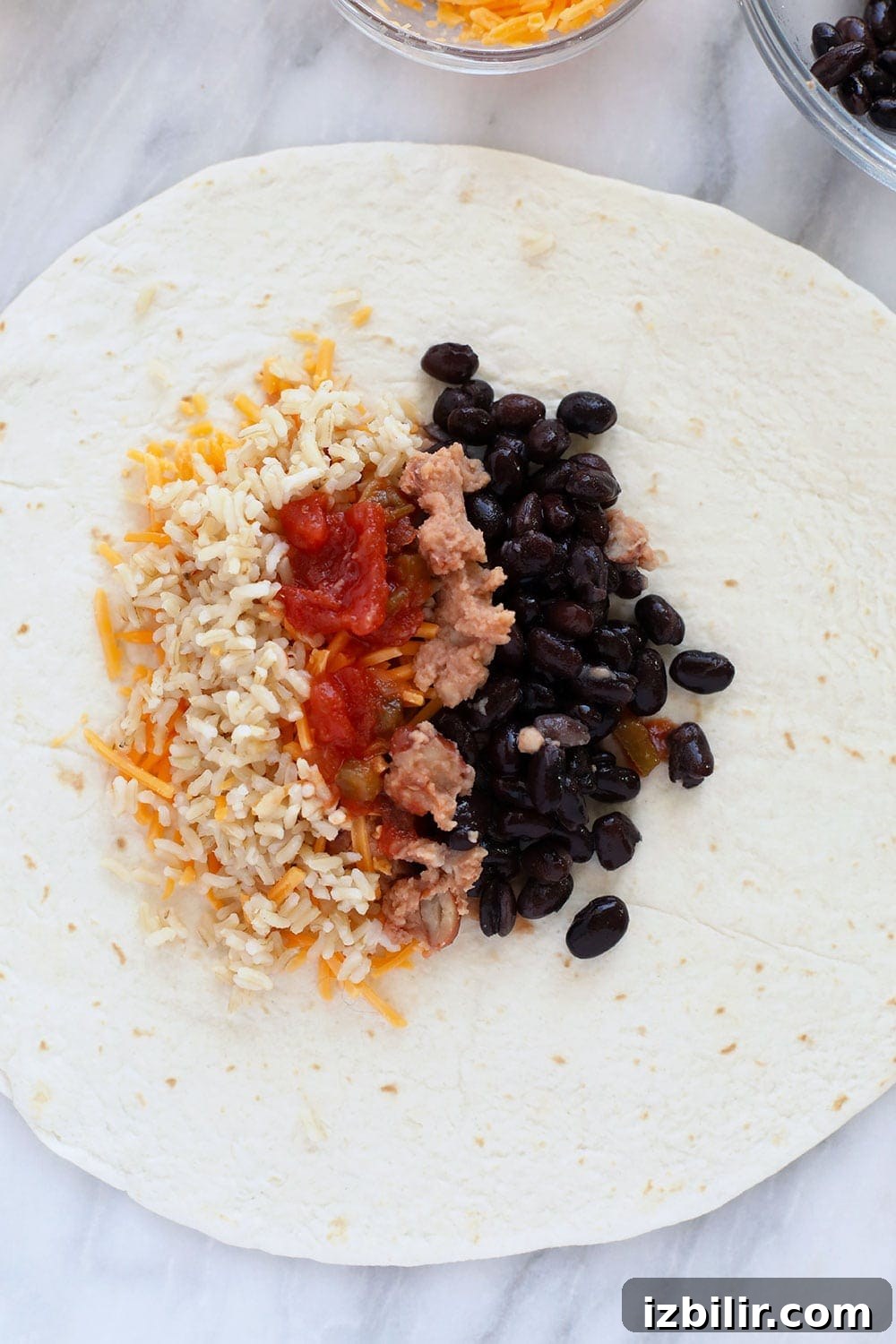 Ingredients layered in tortilla ingredients in tortilla