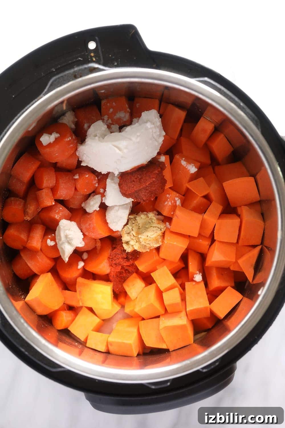 Instant Pot sweet potato carrot ginger soup ingredients in the instant pot