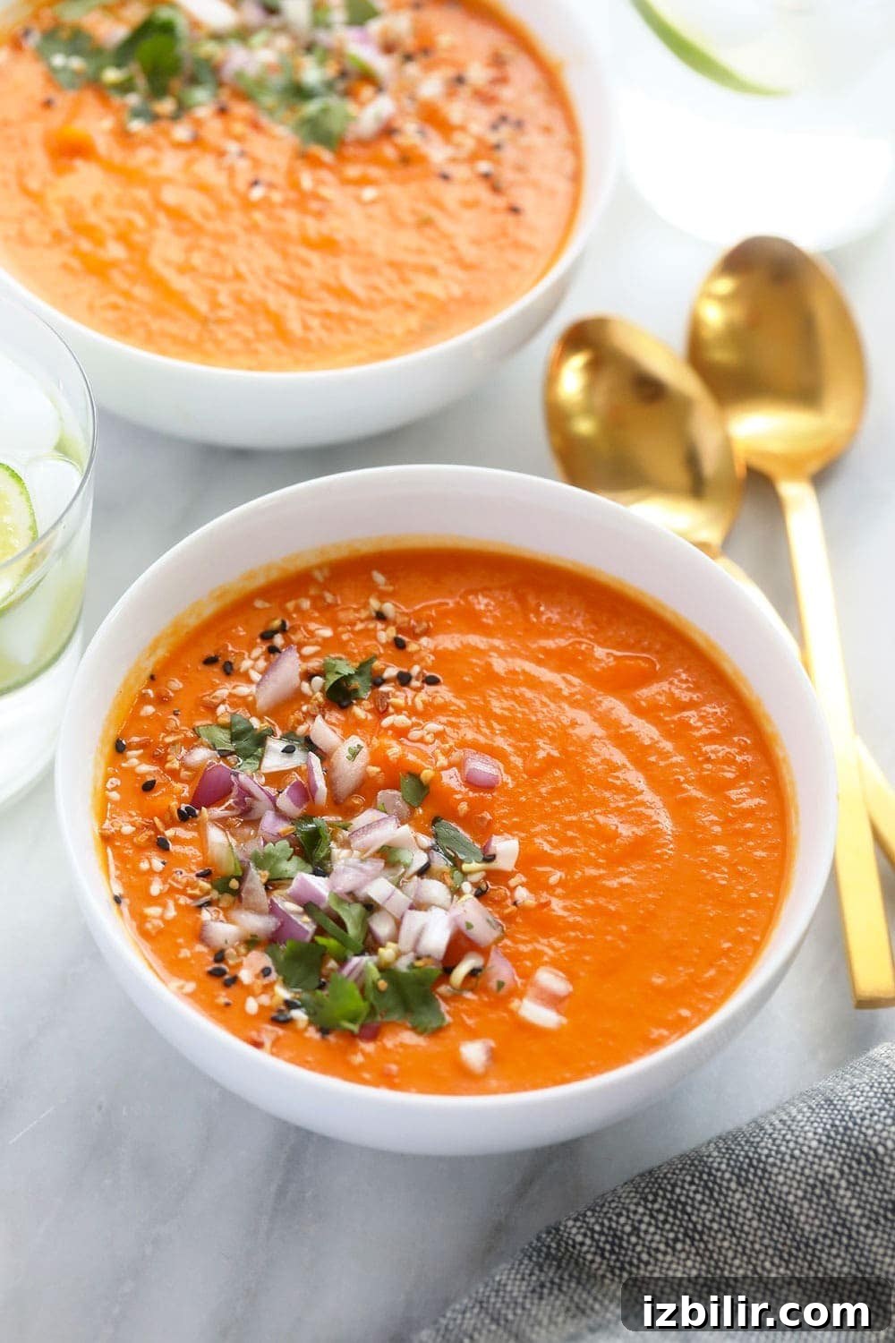 Instant Pot sweet potato carrot ginger soup in a bowl ready to be enjoyed