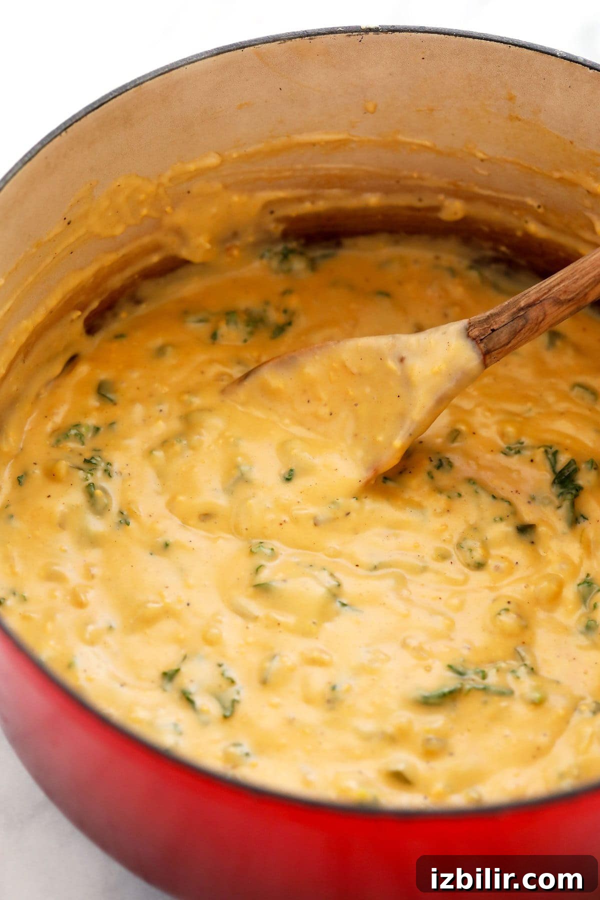 cheese sauce with wilted kale for quinoa mac and cheese