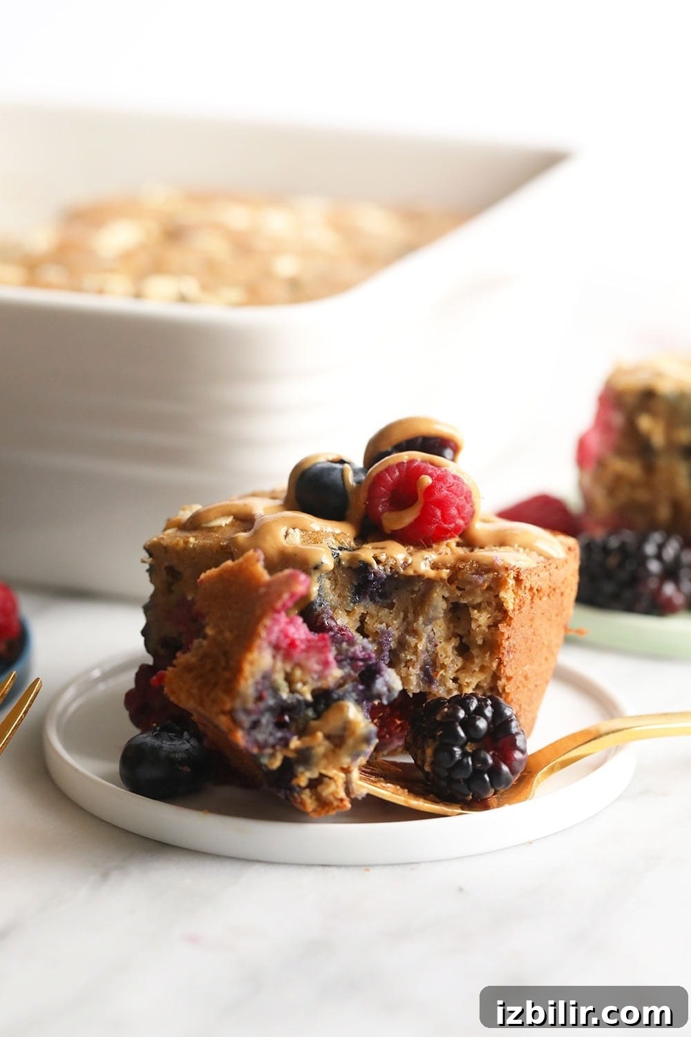 Triple Berry Breakfast Bread Triple berry breakfast bread on a plate.