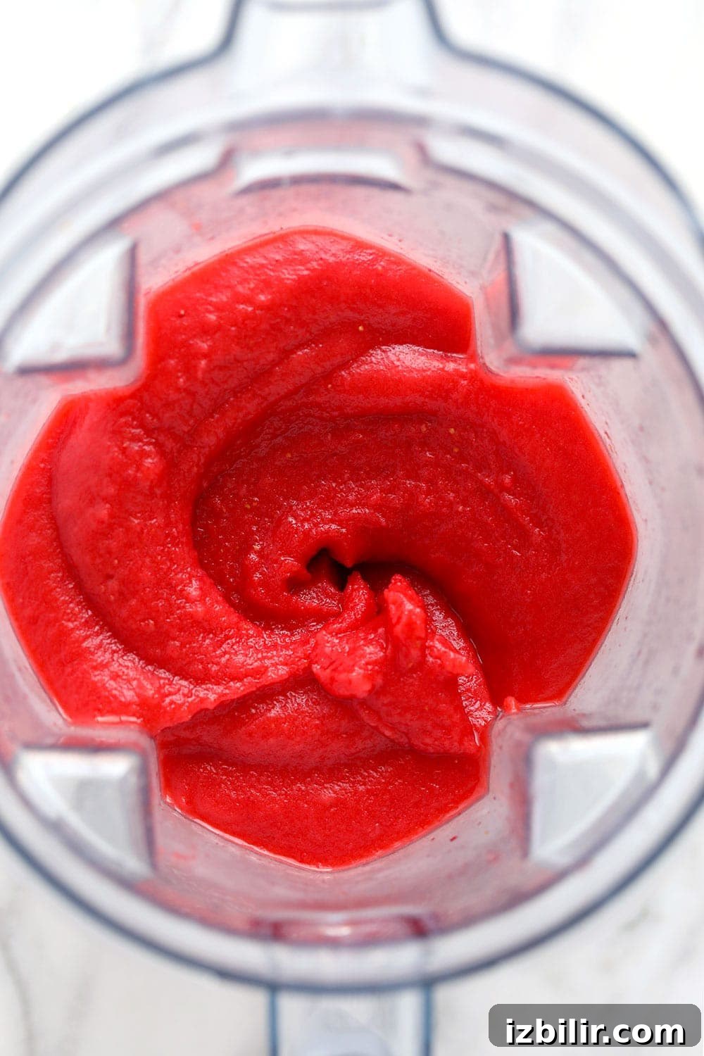 Blended strawberry daiquiris in a blender blended strawberry daiquiris in a blender