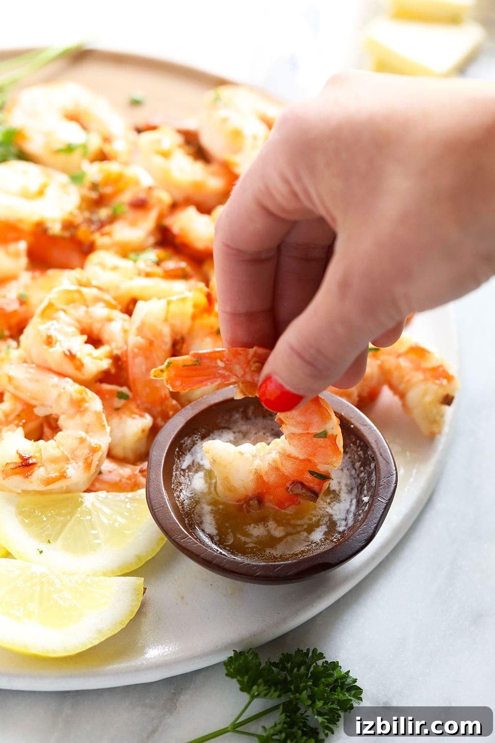 Dipping garlic butter shrimp garlic butter shrimp being dipped in butter