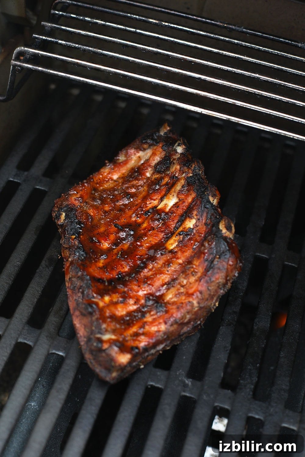 Sous vide ribs caramelizing on the grill