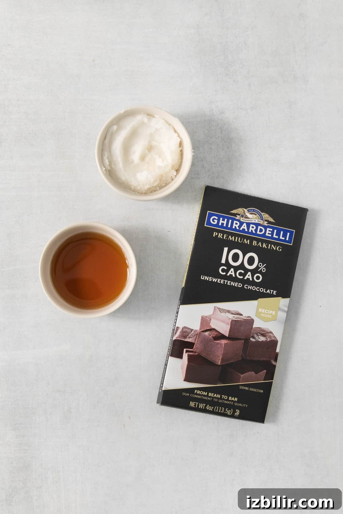 How to Make Homemade Vegan Chocolate Chips 3 A bar of chocolate next to a bowl of tea.