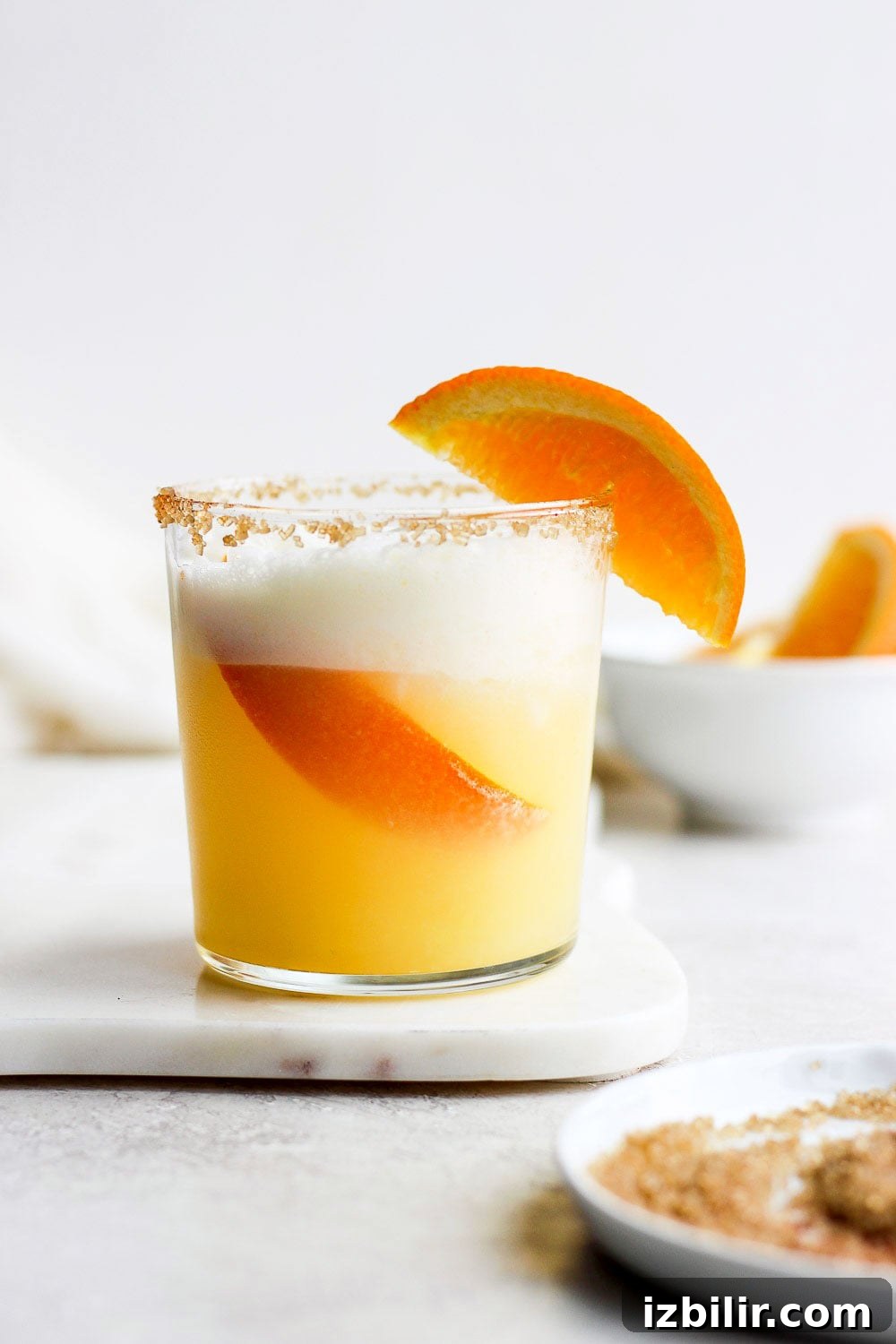 Frothy Orange Creamsicle Cocktail Recipe with Vanilla 2 Orange cocktail in a glass