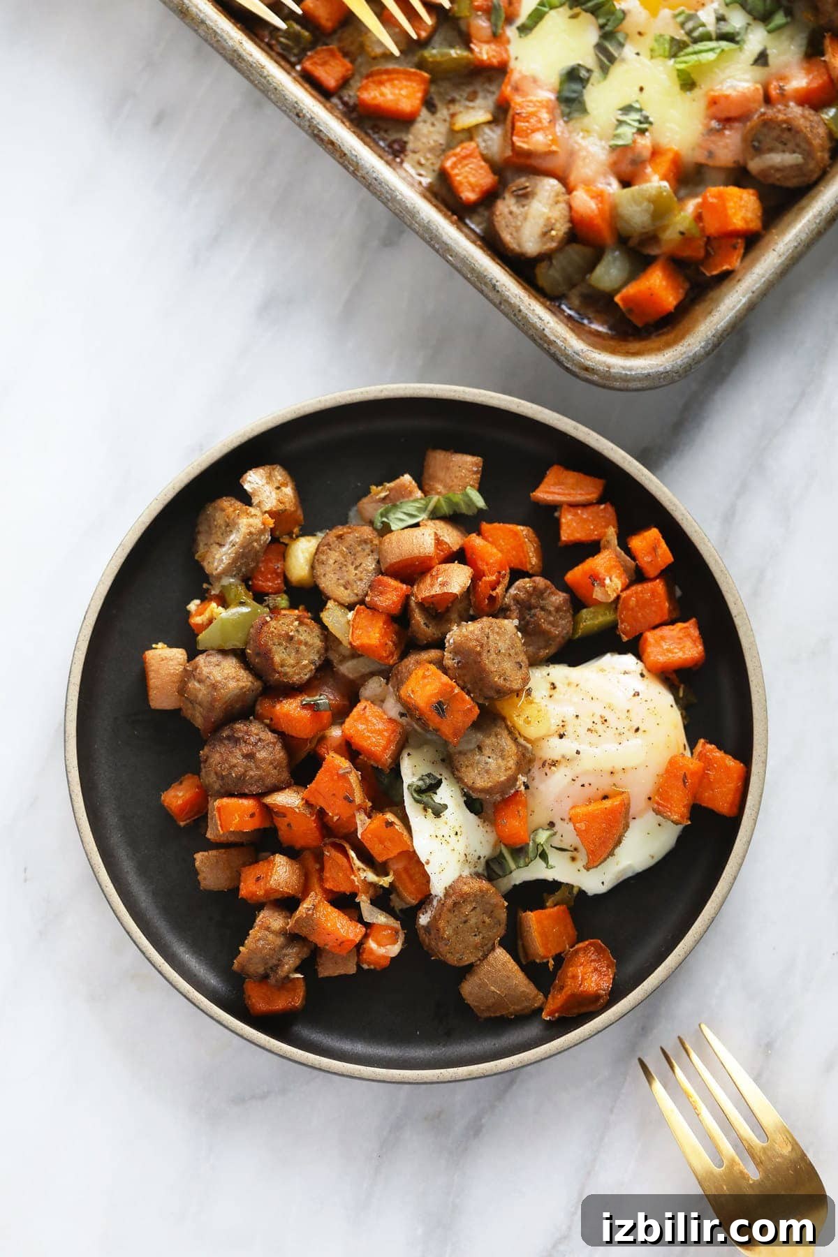 sweet potato hash with baked egg on a plate
