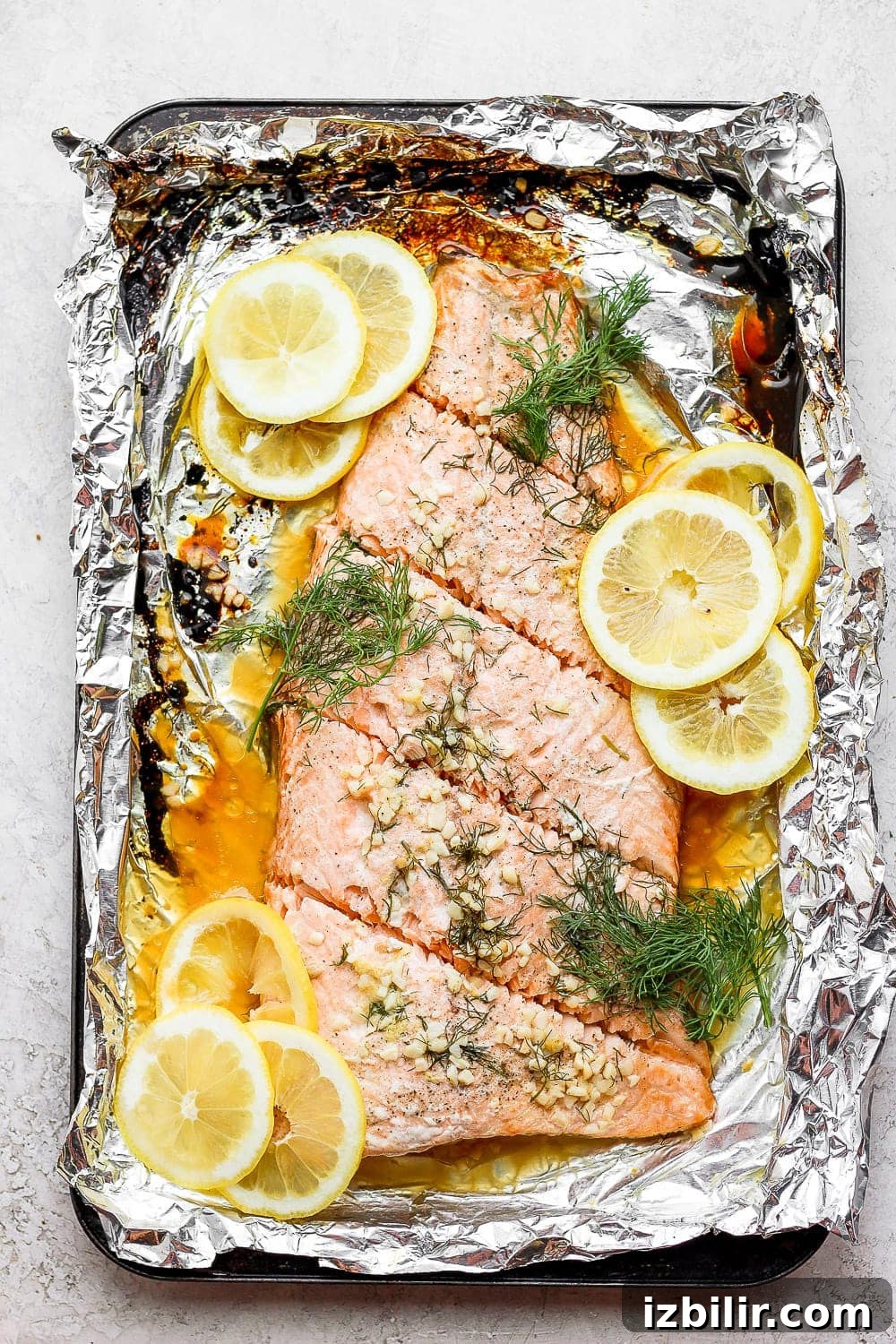 large salmon fillet cut into single servings