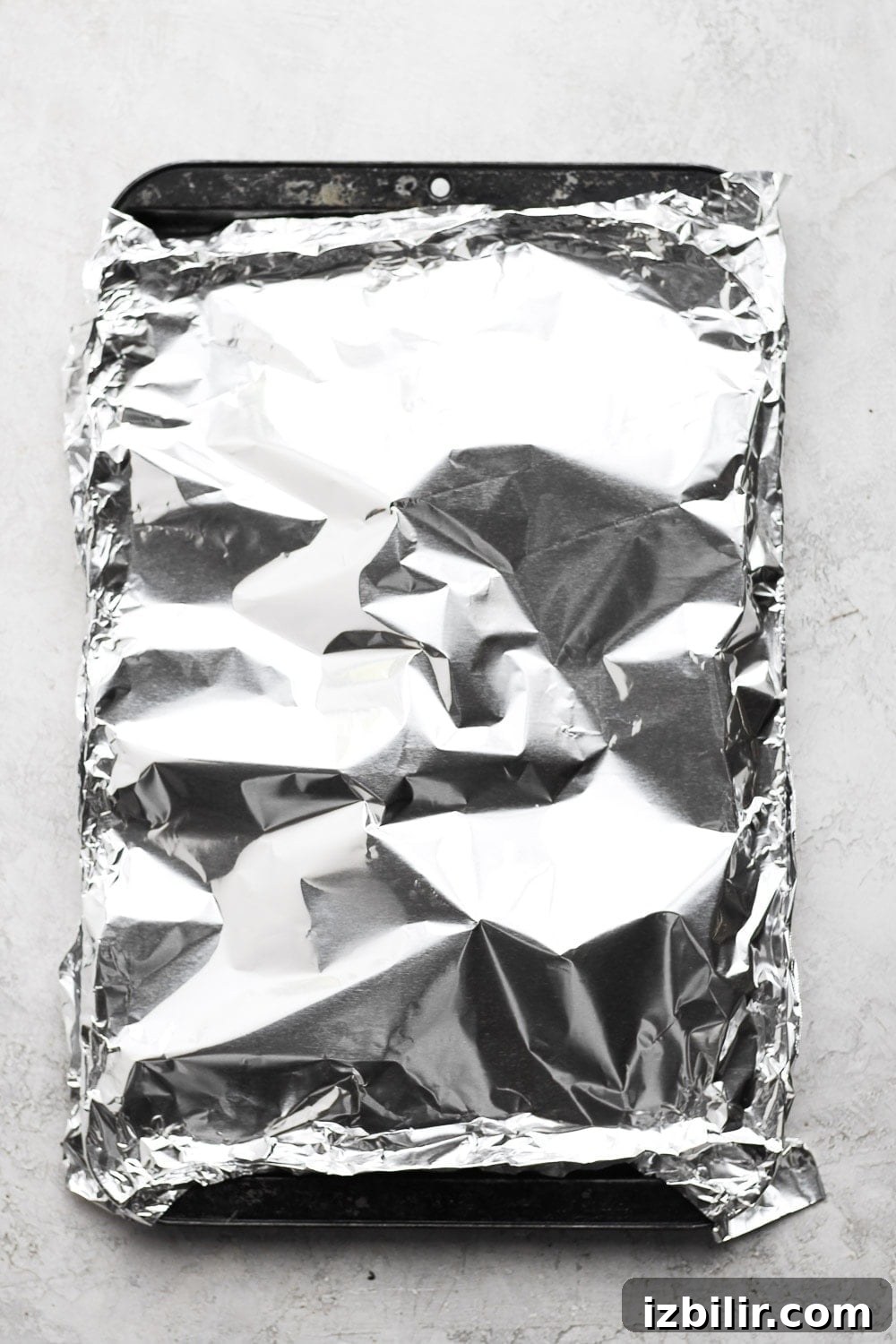baked salmon covered in foil