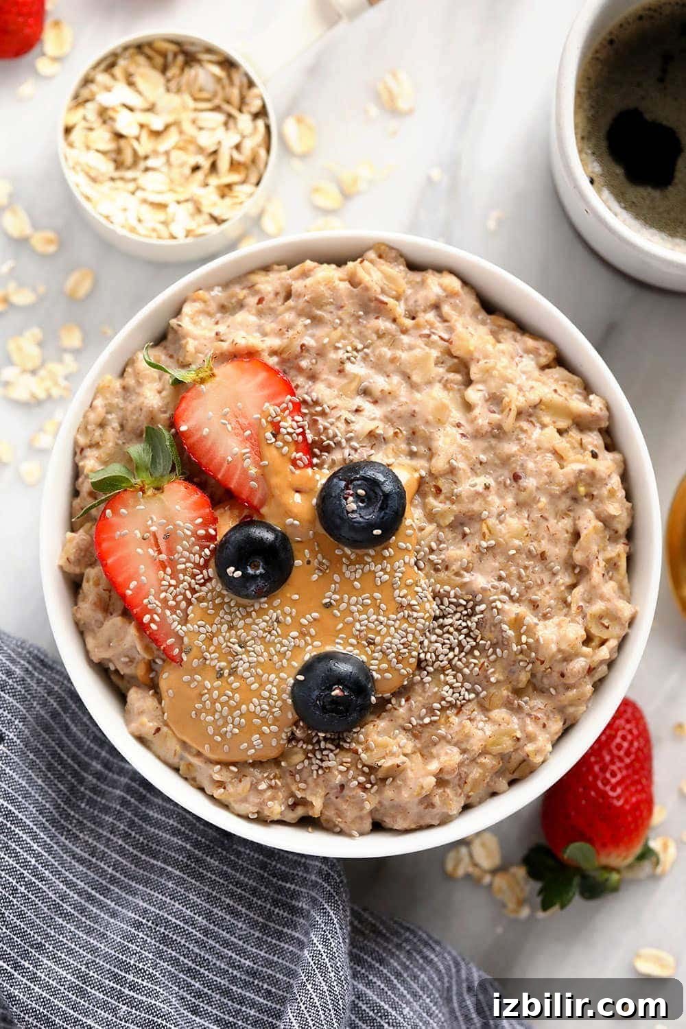 superfood oatmeal bowl topped with berries and chia seeds