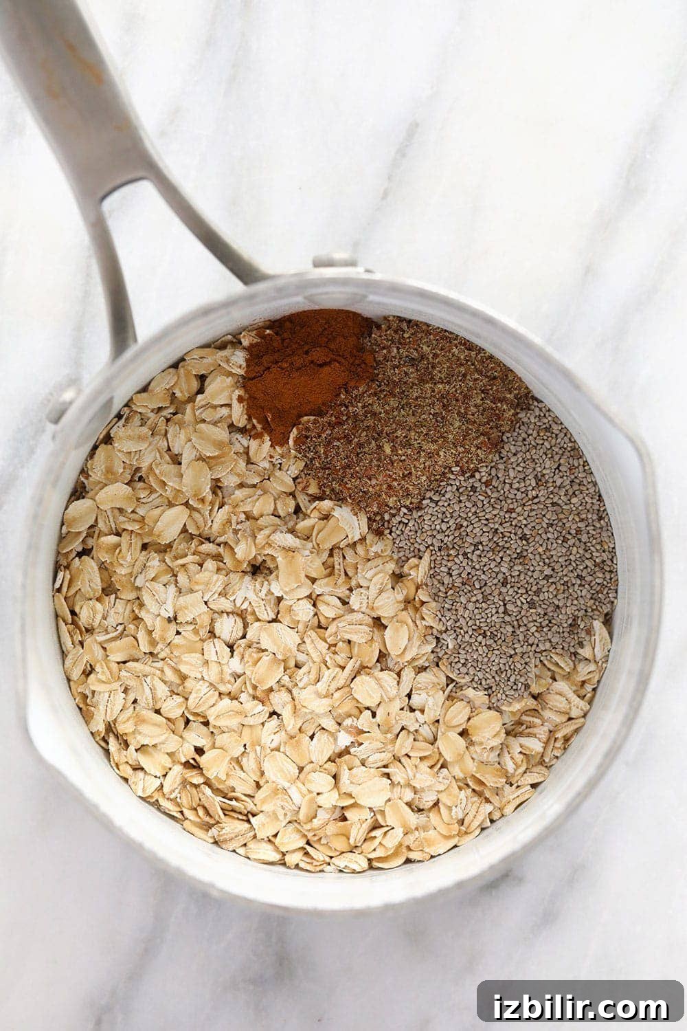 superfood oatmeal bowl ingredients in a pot ready to be cooked