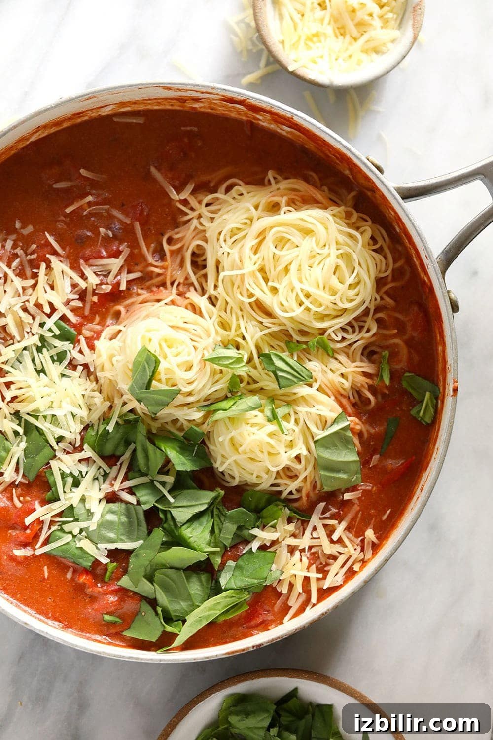 Summer Garden Pasta with Fresh Tomatoes and Herbs 6 Summer pasta recipe with fresh parmesan and basil.