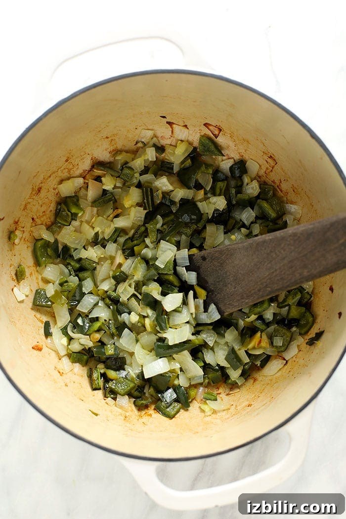 Flavorful Chicken and Bean Green Chili Recipe 3 diced green peppers and onions in stockpot
