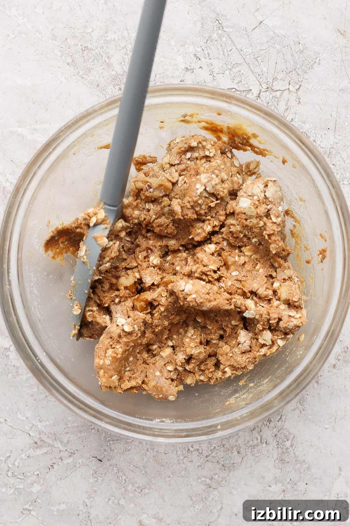 Oat, walnut, protein powder, maple syrup, and nut butter crumble for protein apple crisp.